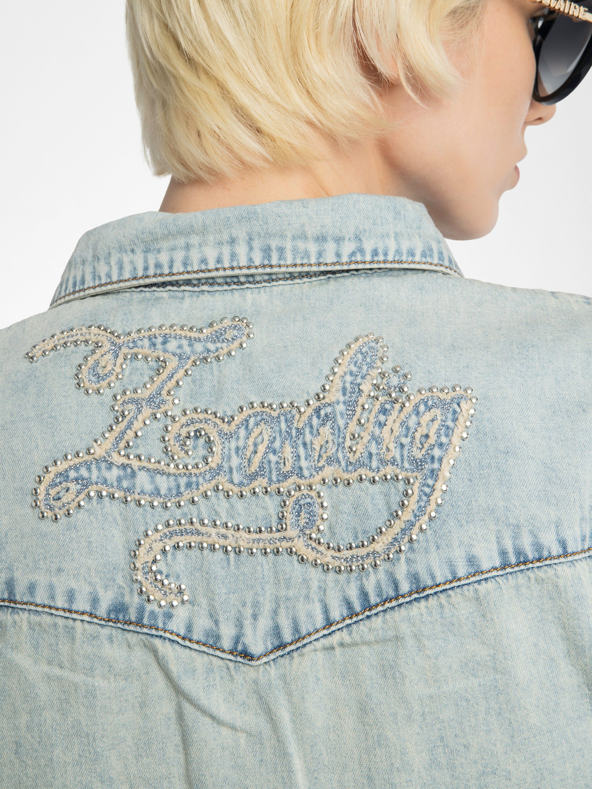 Saby Denim Shirt - Denim shirt with embroidery and studs on the back.